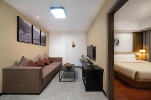 Postel nebo postele na pokoji v ubytování Meeteem Boutique Hotel