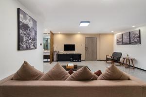 TV a/nebo společenská místnost v ubytování Meeteem Boutique Hotel