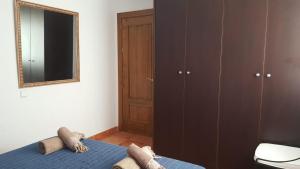 Posteľ alebo postele v izbe v ubytovaní Isleta apartamento con terraza, vistas y WIFI
