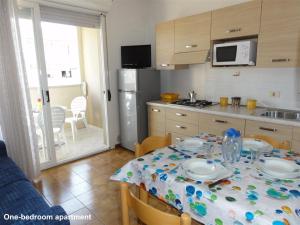 Køkken eller tekøkken på Isola Clara - Appartamenti