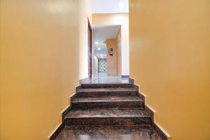 Foto Bangalore’is asuva majutusasutuse FabHotel Rotano Suites - Yelahanka galeriist
