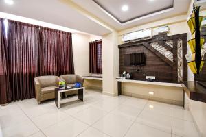 Istumisnurk majutusasutuses FabHotel Rotano Suites - Yelahanka
