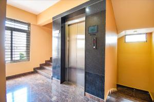 Foto Bangalore’is asuva majutusasutuse FabHotel Rotano Suites - Yelahanka galeriist
