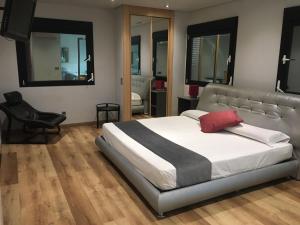 מיטה או מיטות בחדר ב-Hotel Fabrik