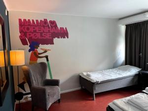 Postel nebo postele na pokoji v ubytování HOTEL N Hostel Malmö City