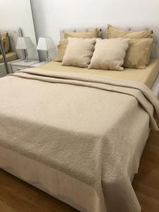 Postel nebo postele na pokoji v ubytování Apartman Ramljak