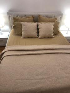 Postel nebo postele na pokoji v ubytování Apartman Ramljak