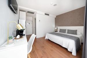 A bed or beds in a room at Hotel Matilde by Grupo Matilde