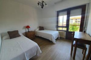Postel nebo postele na pokoji v ubytování La Casita de Irene