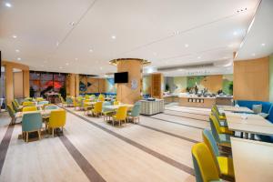 Posezení v ubytování Holiday Inn Express Shanghai Zhenping by IHG