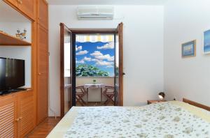 Postel nebo postele na pokoji v ubytování Apartment Milan 1174