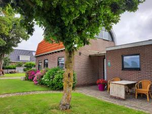 Gallery image of Private Logies Texel Woodart in Midden-Eierland