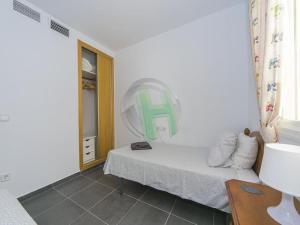 Łóżko lub łóżka w pokoju w obiekcie 3504 Imperial Park Spa Resort, Calpe