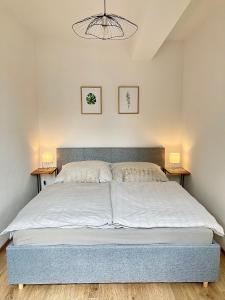 Postel nebo postele na pokoji v ubytování Apartman Riviera 41