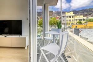 TV a/nebo společenská místnost v ubytování Alse Homes Adeje
