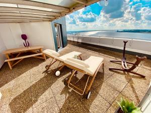 Balkón nebo terasa v ubytování COAST HOUSE Sky Suite