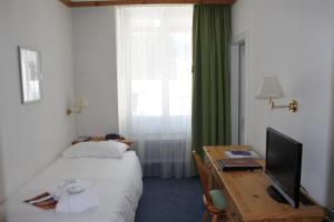 Postel nebo postele na pokoji v ubytování Hotel Meierhof