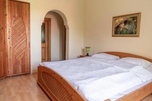 Postel nebo postele na pokoji v ubytování APA Mountain Lodge