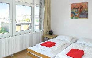 Postel nebo postele na pokoji v ubytování Maisonette Aan Zee