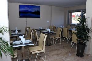 TV a/nebo společenská místnost v ubytování Hotel Residence Imiplage