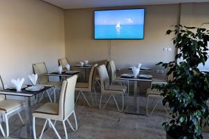TV a/nebo společenská místnost v ubytování Hotel Residence Imiplage