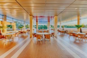 Restoran või mõni muu söögikoht majutusasutuses Hotel Lion