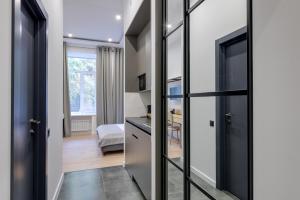 Postel nebo postele na pokoji v ubytování Centrooms Kropivnizkogo Mini-Hotel