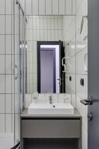 Koupelna v ubytování Centrooms Kropivnizkogo Mini-Hotel