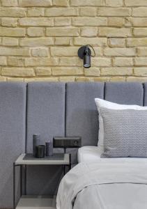 Postel nebo postele na pokoji v ubytování Centrooms Kropivnizkogo Mini-Hotel