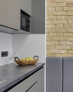 Kuchyň nebo kuchyňský kout v ubytování Centrooms Kropivnizkogo Mini-Hotel