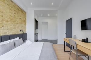 TV a/nebo společenská místnost v ubytování Centrooms Kropivnizkogo Mini-Hotel