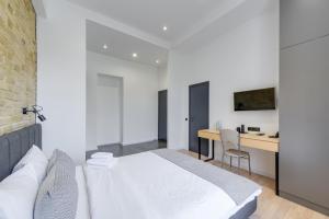 Postel nebo postele na pokoji v ubytování Centrooms Kropivnizkogo Mini-Hotel
