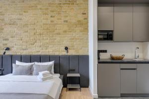 Postel nebo postele na pokoji v ubytování Centrooms Kropivnizkogo Mini-Hotel