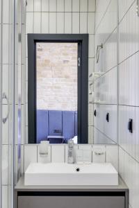 Koupelna v ubytování Centrooms Kropivnizkogo Mini-Hotel