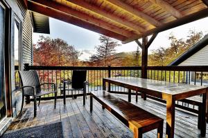 A balcony or terrace at Chalet- 21 Chemin des Skieurs