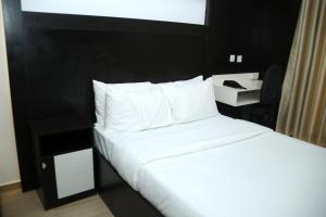 Katil atau katil-katil dalam bilik di Hotel Capitol