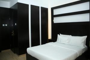 Katil atau katil-katil dalam bilik di Hotel Capitol