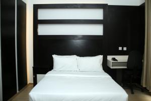 Katil atau katil-katil dalam bilik di Hotel Capitol