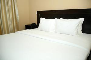 Katil atau katil-katil dalam bilik di Hotel Capitol