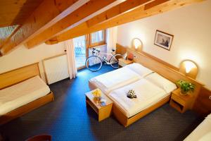 Postel nebo postele na pokoji v ubytování Hotel Waldheim