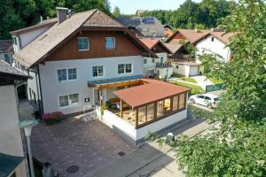 an aerial view of a house with a roof at Gasthof-Pension Riedl in Vöcklamarkt