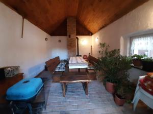 a living room with a couch and a table at Ardó Vendégház in Sárospatak