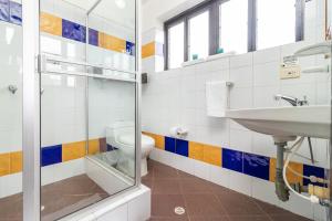 Een badkamer bij Ayenda Casa Kolping