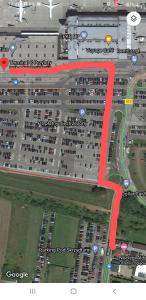 una mappa di un parcheggio con freccia rossa di Alda Gold a Pyrzowice
