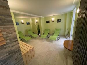 Posezení v ubytování Hotel Garni Maaß
