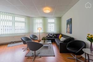 Posezení v ubytování Spacious and modern furnished apartment for 10 guests