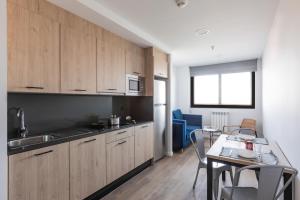 A kitchen or kitchenette at Micampus Santander Student Residence