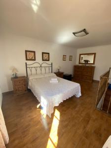 Postel nebo postele na pokoji v ubytování Casita de Rosario + 37 fotografií