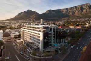 an aerial view of cape town with table mountain in the background at The Capital 15 on Orange Hotel & Spa in Cape Town