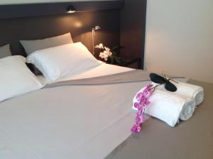 Postel nebo postele na pokoji v ubytování GFH - Hotel Ruhig